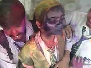 Video of classmate getting her colors rubbed during Holi festival