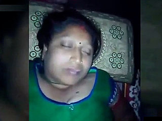 Indian husband awakens sleeping wife for intimate encounter