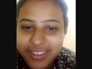 Bhabhi proudly displays her large breasts and unshaven genitalia