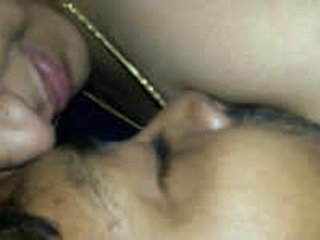 Aroused Indian aunt's boyfriend eagerly sucks her breasts