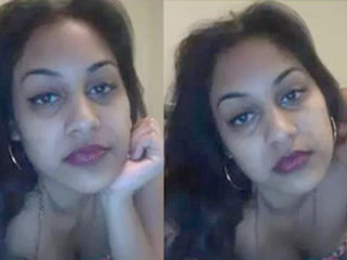 A South Asian woman pleasures herself with a black penis