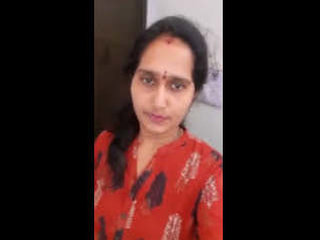 A mature Indian woman teases with her buttocks