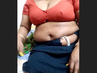 Mature auntie in blouse indulges in risqué behavior on film