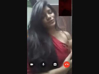 A stunning woman displays her breasts and genitals during a video call on Messenger