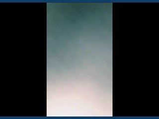 Sexy Pakistani wife with large breasts sensually caressing and engaging in sexual activity in a combined video