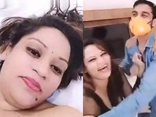 Indian couples engage in a threesome in a hotel room