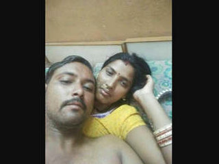 Indian spouse with large breasts indulges in risqué behavior on film