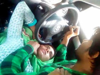 Indian couple shares romantic moments in a car