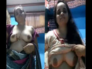 High-definition video of an Indian wife unveiling her bare breasts