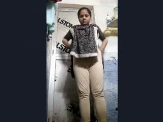 Video of an Indian girl taking a bath