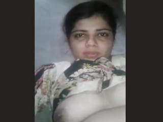 Aroused South Asian housewife pleasuring herself