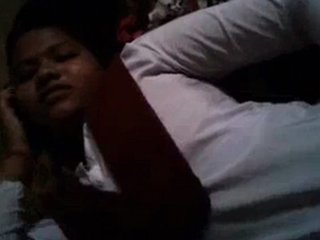 A college girl in a dress receives oral and manual stimulation from her partner