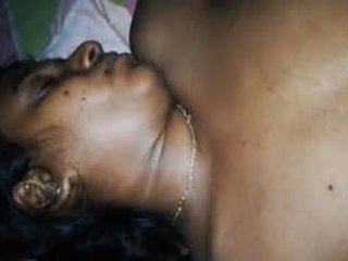 Husband wakes wife up and fondles her breasts while taking pictures