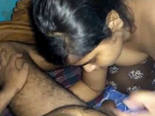 A lovely girl performs oral sex and receives her husband's ejaculation on her breasts