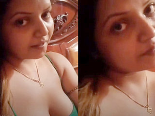 Indian girl with large breasts performs live