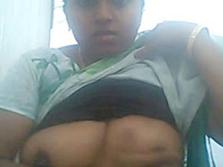 Indian aunt's sensual breast display and intimate encounter in live broadcast
