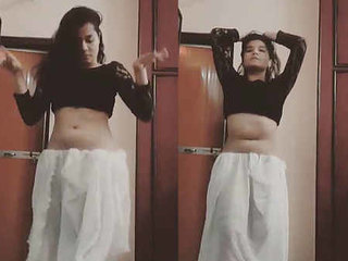 Seductive Indian beauty performs erotic belly dance while pleasuring herself