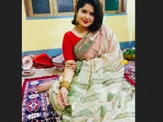 A stunning Bengali beauty prepares for a passionate encounter in high definition