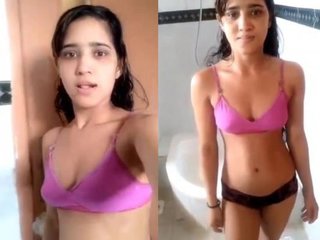 Young and lovely girl prepares for a relaxing bath