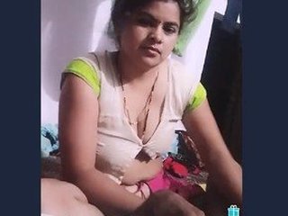 Indian wife gives a small handjob in this video