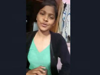 A seductive Indian woman removes her clothing and exposes her nude physique to her partner for financial gain
