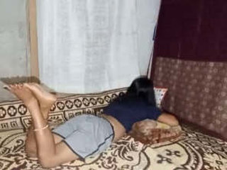 A Sri Lankan beauty engages in intimate activities with her partner while focusing on her education