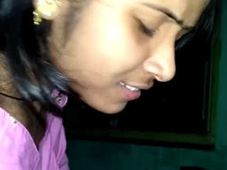 A beautiful Indian woman pleases her boyfriend with oral sex
