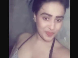 A stunning Indian woman flaunts her beauty and sensuality