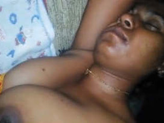 Husband awakens sleeping wife and touches her breasts
