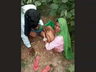 A rural couple discovered engaging in outdoor sex