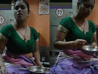 Elderly woman's breasts exposed in traditional Indian garment