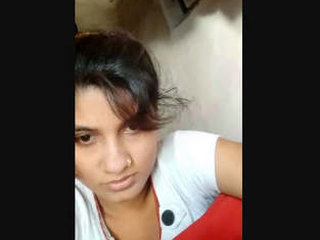 Aroused South Asian rural woman pleasuring herself with her fingers