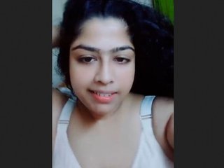 Indian girl flaunts her large breasts and pink pussy