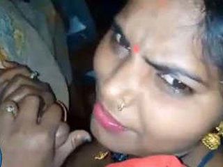 Desi bhabhi gives a nice blowjob in this video