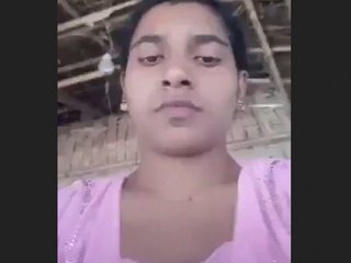 A village bhabhi pleasuring herself in the open air