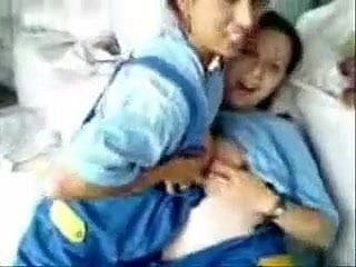 Two girls pleasure each other's nipples in a variety of positions