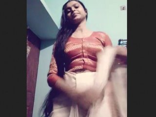 Cute girl slowly stripping naked for the camera