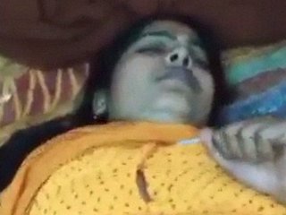 Desi aunty in yellow sari gets shaved and fucked hard