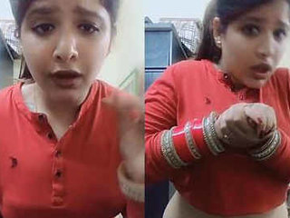 Watch a cute girl with a big belly and a deep navel in action