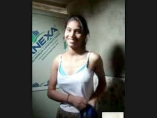 Cute desi girl shows off her curves in a video clip