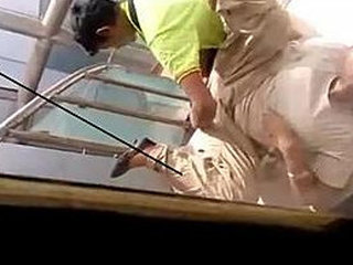 Shopping mall employee caught fondling auntie on stairs