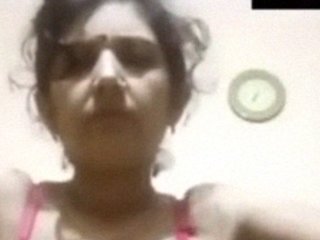 Watch Sada Aunty from Bangalore strip and masturbate on live video