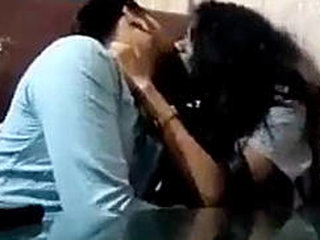 Desi couple kisses passionately in a cafe