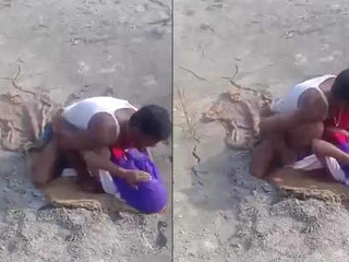 Horny couple has outdoor sex in the field
