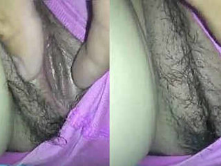 Hubby fingering his wife's pussy in a steamy video