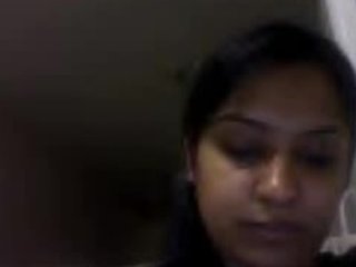 Indian wife in bed with her husband