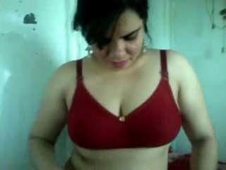 Radha Bhabhi in a red bra and panties, speaking dirty in Hindi
