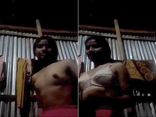 Amateur Indian girl changes into sexy clothes in a village setting