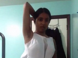 Hot girl strips and teases in solo video