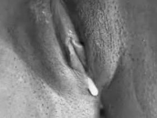 Clean-shaven aunt's pussy gets fucked in a steamy video